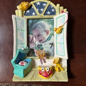 Whimsical Kids' Photo Frame with Fun Characters